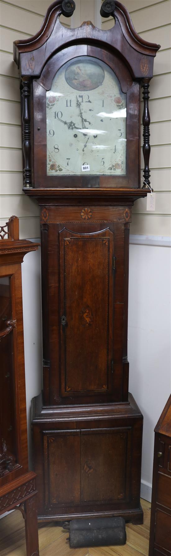 An early 19th century mahogany and oak eight day longcase clock